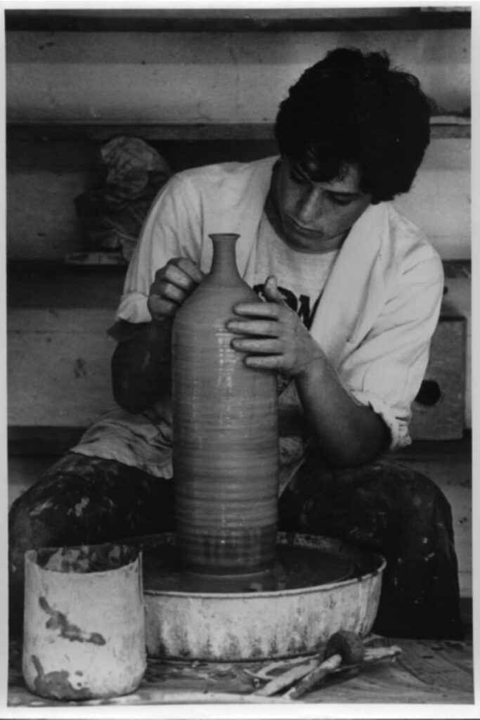Young Jonathan potting behind the design